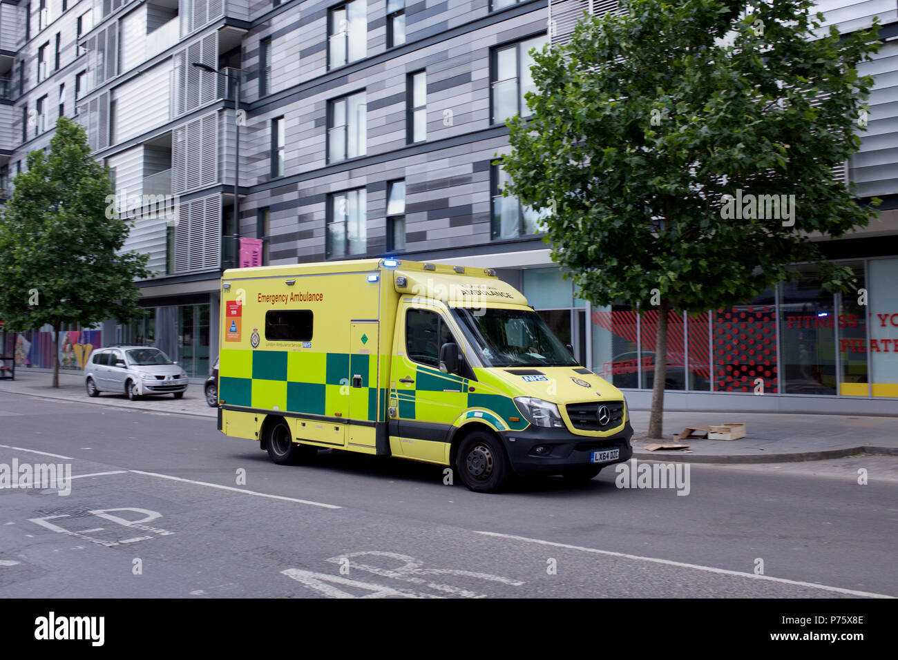 Ambulance on an emergency call in York Way, Kings Cross in London Stock Photo