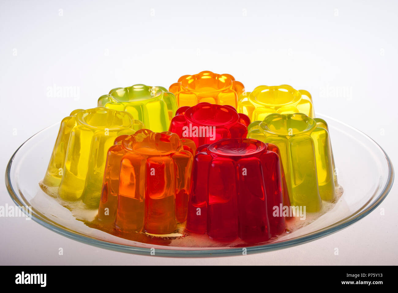 colored fruit jelly on white background Stock Photo - Alamy