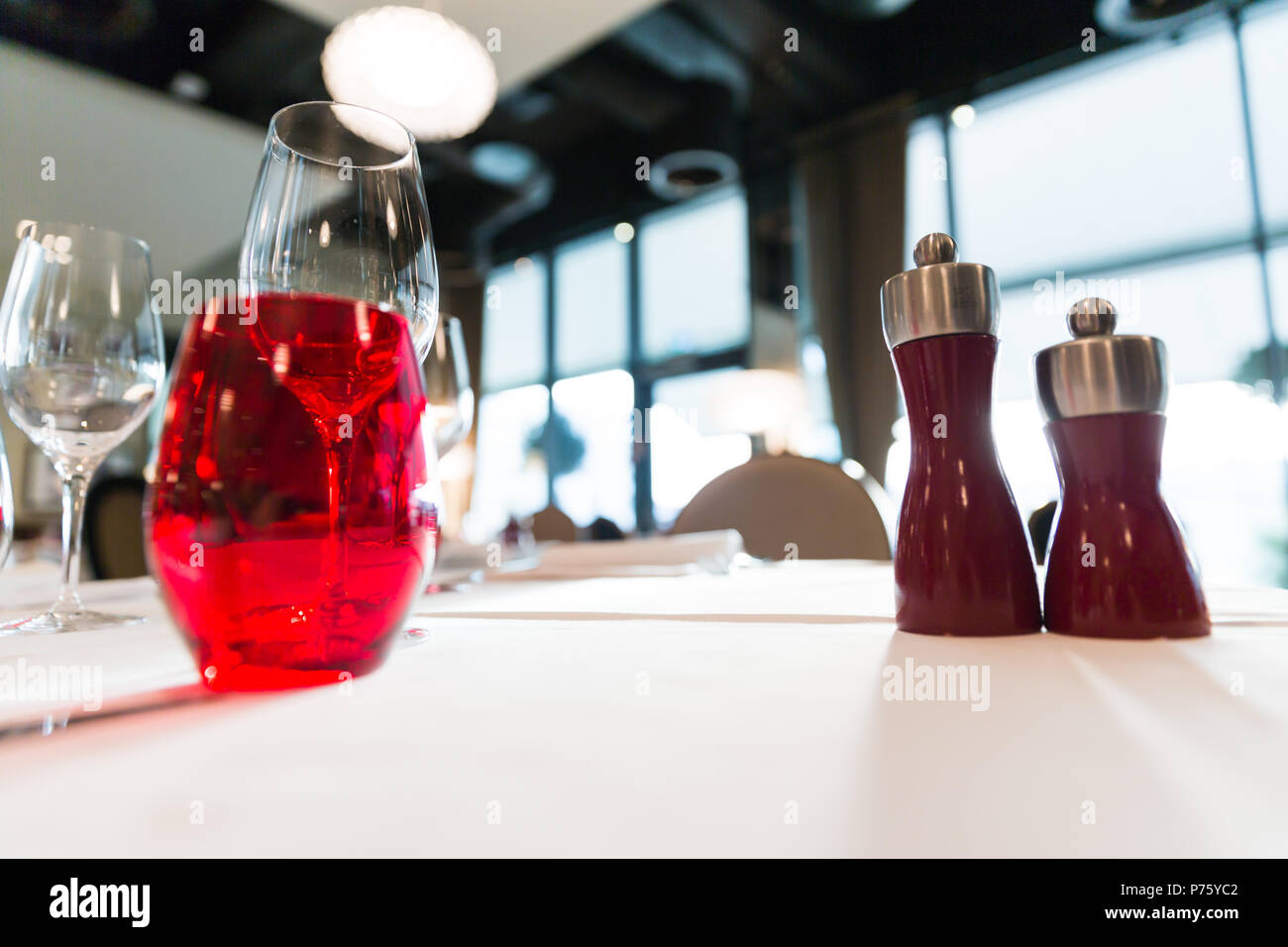 Backlit Restaurant Table with Red, White Decoration Stock Photo - Alamy