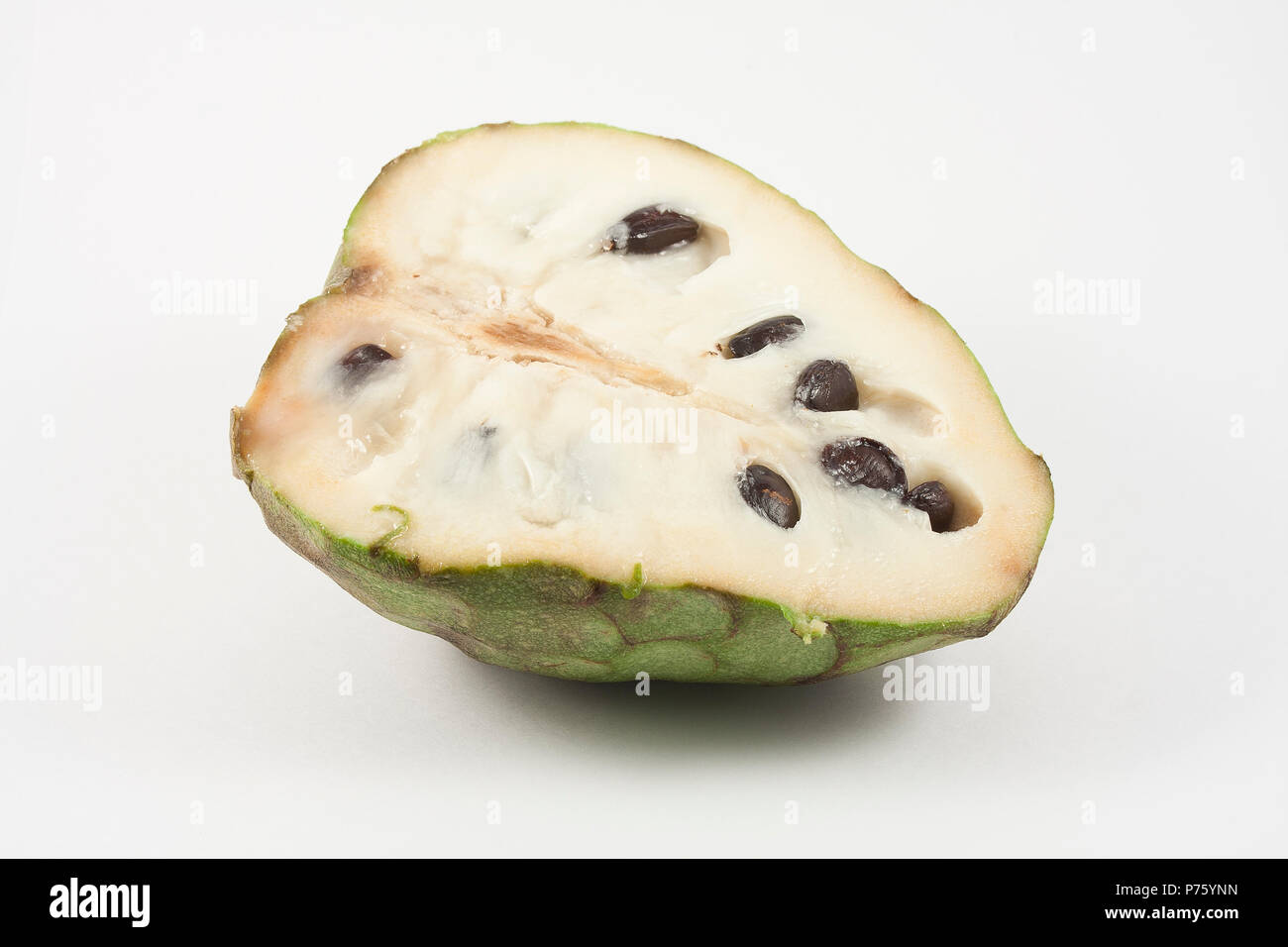 chirimoya halved isolated on white background Stock Photo