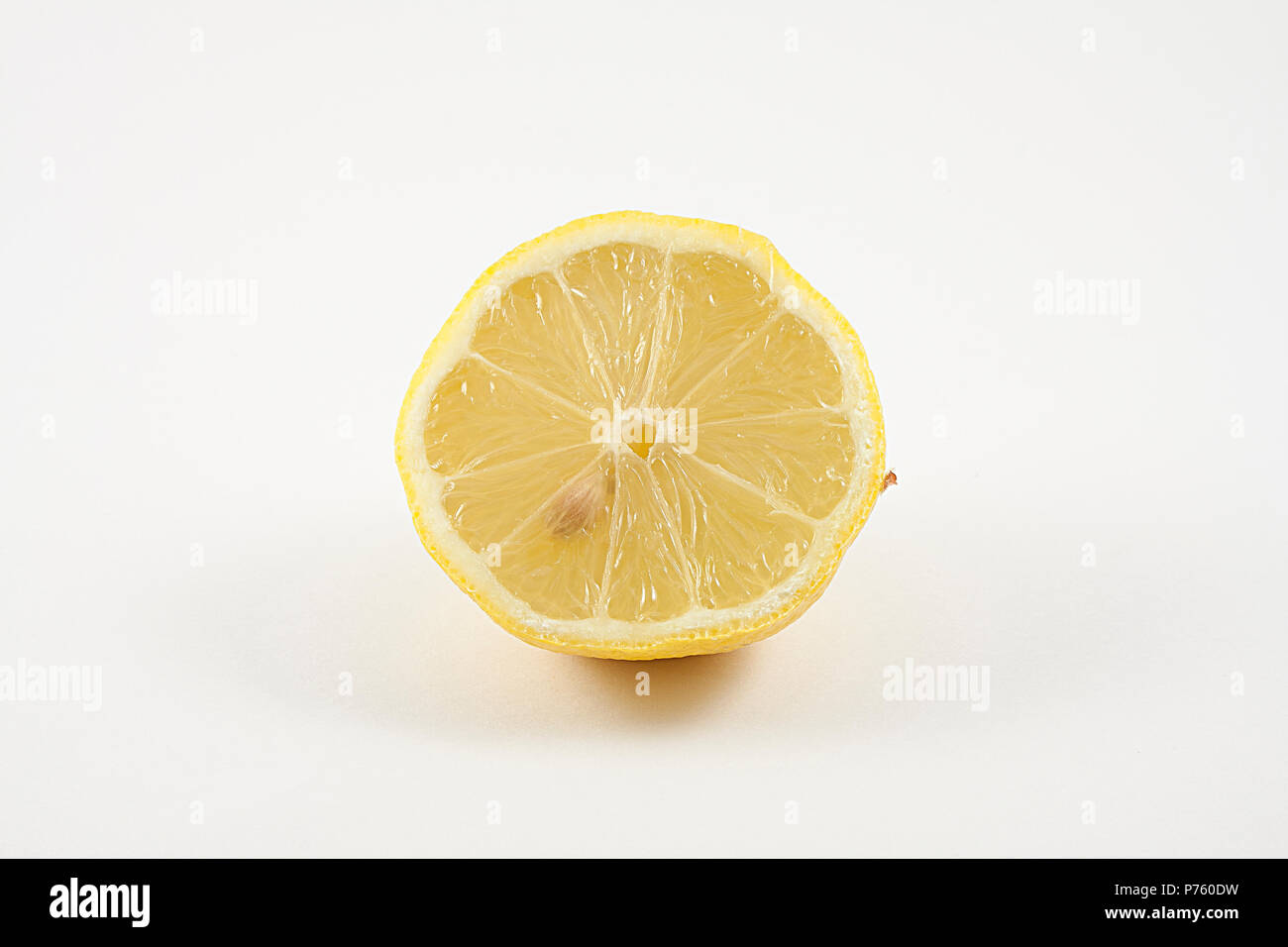 lemon cut in half isolated on white background Stock Photo Alamy