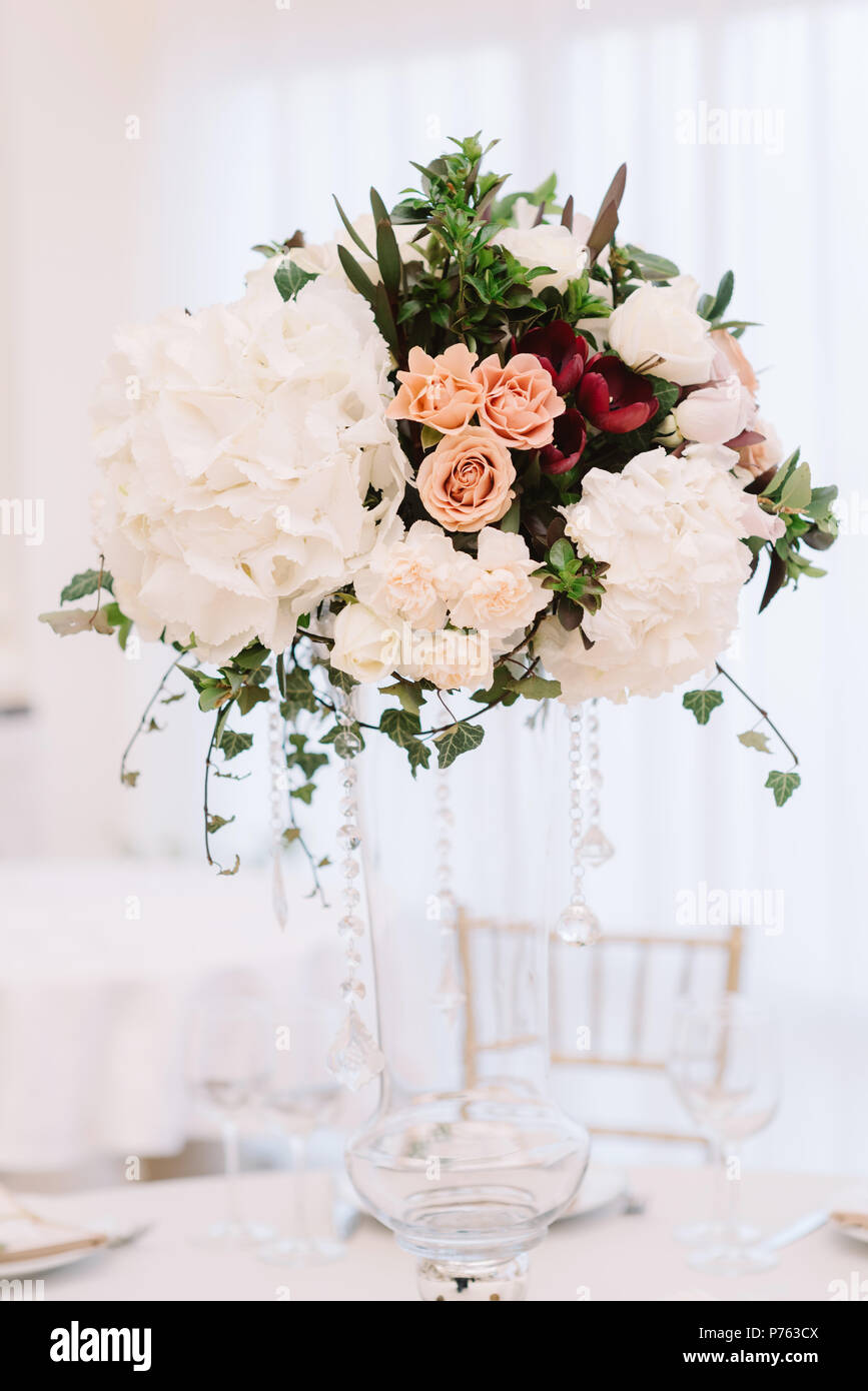 Magnificent Volume Bouquets Of Flowers In High Glass Vases