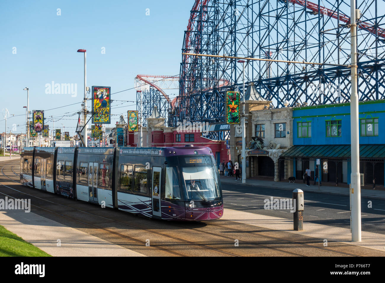 Blackpool tram with the Pleasure Beach in the background Stock Photo
