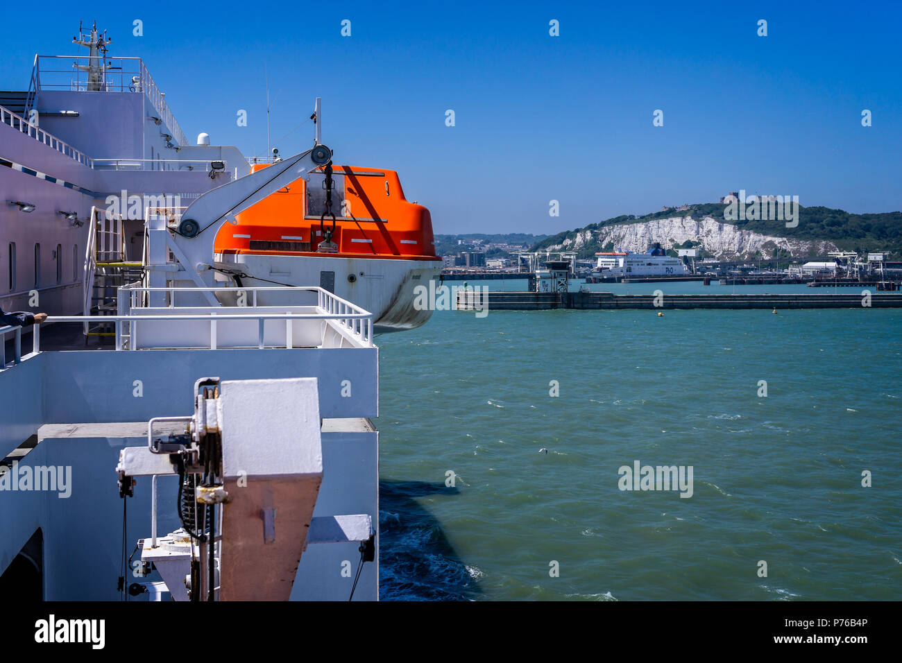 Ferry coming in to dock at Dover Port taken from a ferry in Dover, Kent, UK on 30 June 2018 Stock Photo