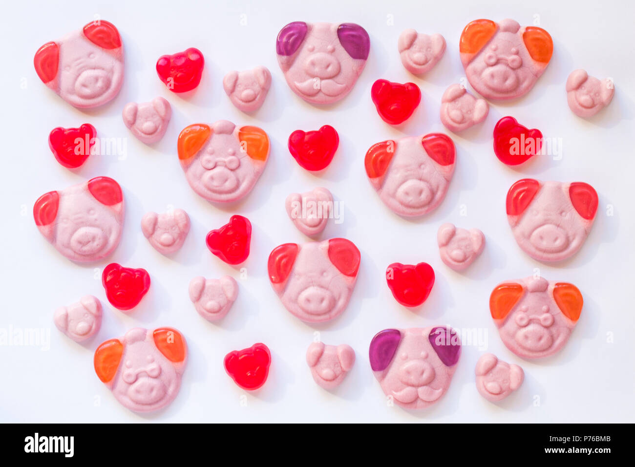 percy's parents and percy piglets percy pig sweets spread set on white background - soft gums made with fruit juice Stock Photo