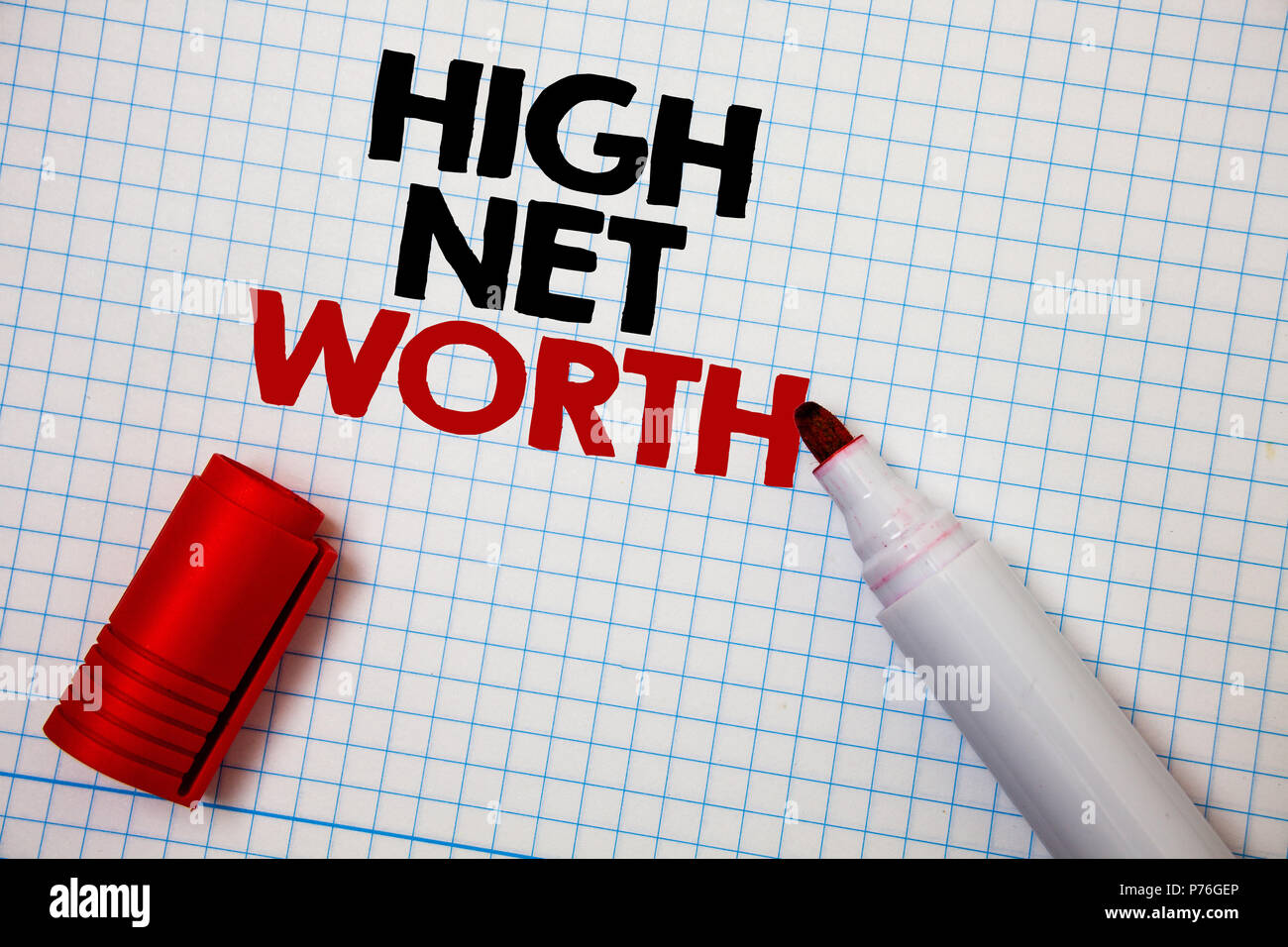 Writing note showing  High Net Worth. Business photo showcasing having high-value Something expensive A-class company Graph paper grey important thoug Stock Photo