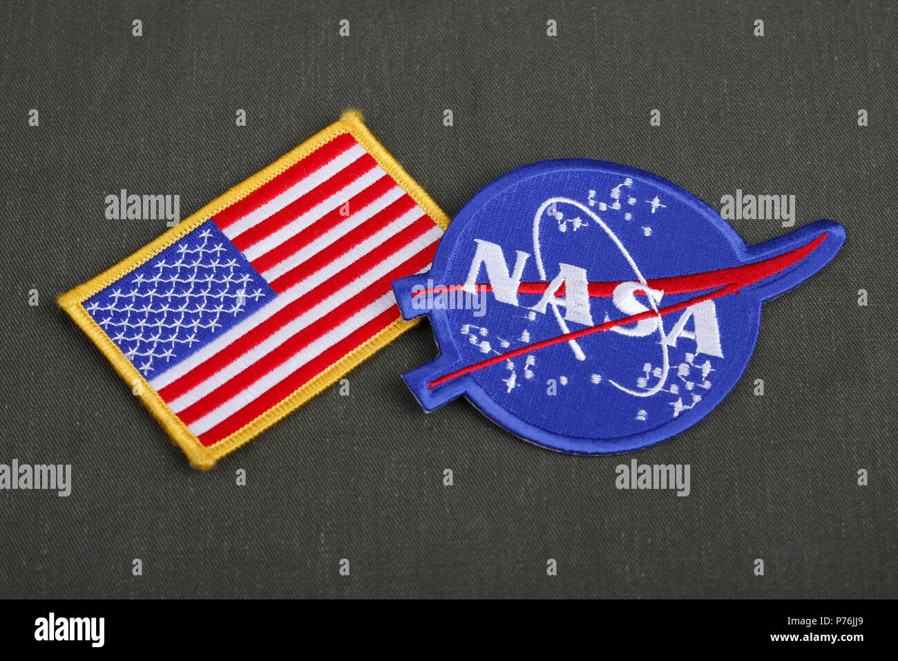 15 March 2018 - The National Aeronautics and Space Administration (NASA)  emblem patch and US Flag patch on green uniform background Stock Photo -  Alamy