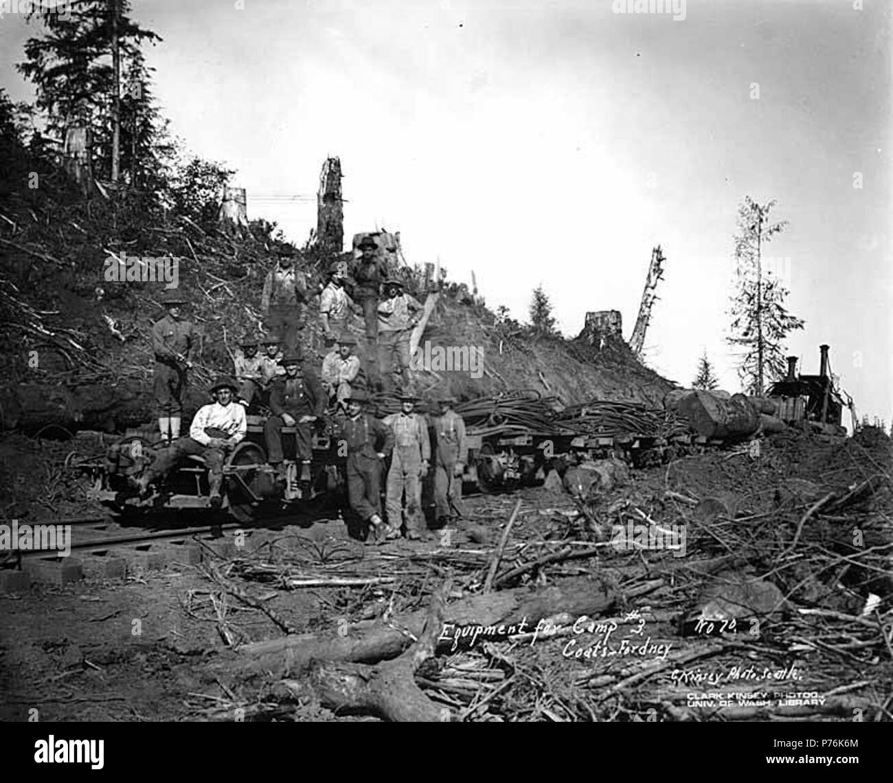 . English: Equipment for camp 3 on flatbed cars, along with crew members, including Spruce Division soldier, Coats-Fordney Lumber Company, near Aberdeen, ca. 1918 . English: Caption on image: Equipment for Camp 3. Coats-Fordney. C. Kinsey Photo, Seattle. No. 70 PH Coll 516.630 The Coats-Fordney Lumber Company started out as the A.F. Coats Lumber Company in 1905, headquartered in Aberdeen. It became the Coats-Fordney Lumber Company in 1910, and by 1924, it was called the Donovan-Corkery Lumber Company. Aberdeen is a city in Grays Harbor (formerly called Chehalis) County. The town was platted by Stock Photo
