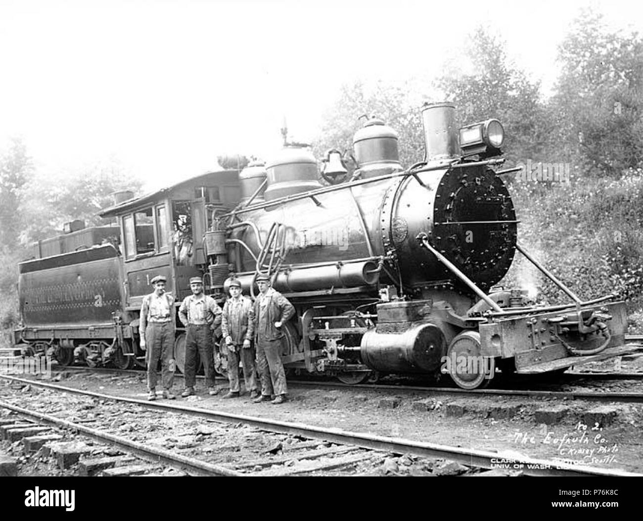 . English: Eufaula Company 2-6-2 Baldwin locomotive no. 1 with crew, ca. 1921 . English: Caption on image: The Eufaula Co. C. Kinsey Photo, Seattle. No. 2 PH Coll 516.1148 The Eufaula Company was in business ca. 1915 to ca. 1926. Eufaula is a former logging town which is now practically deserted two miles north of the Columbia River and four miles northwest of Longview in western Cowlitz County. In the late 1880s the town was named by Jefferson D. Brock, an employee of a logging company, for his home town in Alabama Subjects (LCTGM): Railroad locomotives--Washington (State); Railroad tracks--W Stock Photo