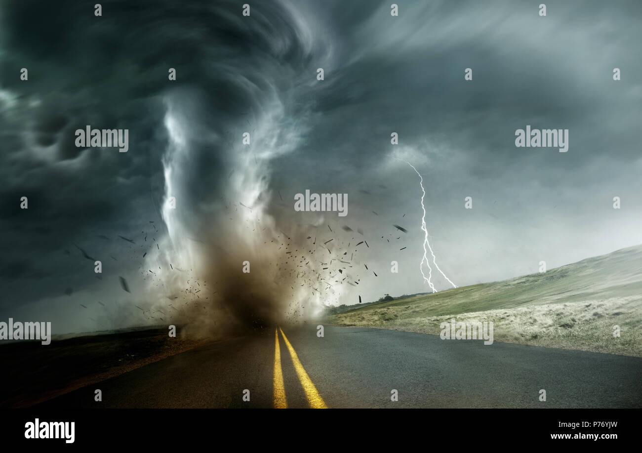 A powerful and dark storm producing a tornado crossing through fields and roads. Dramatic Landscape Mixed media illustration. Stock Photo