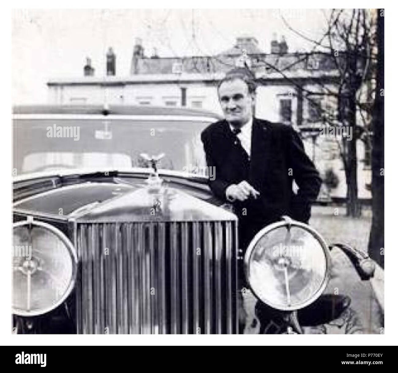 English: Edward Arnold (Eddie) Chapman 1914-1997; gangster and WW2 double agent pictured aside his Rolls Royce. 6 February 2013, 11:58:17 1 Eddie Chapman with car Stock Photo
