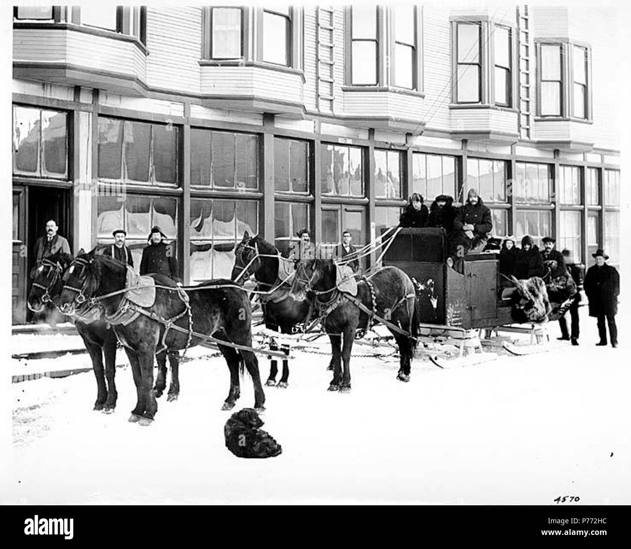 . English: Council City Stage, Nome, November 28, 1908 . English: On verso of image: Council City Stage of Gold Beach Development Co., Nome, Alaska, Nov. 28, 1908. Subjects (LCTGM): Stagecoaches--Alaska--Nome; Streets--Alaska--Nome; Horses--Alaska--Nome; Group portraits  . 1908 3 Council City Stage, Nome, November 28, 1908 (NOWELL 149) Stock Photo