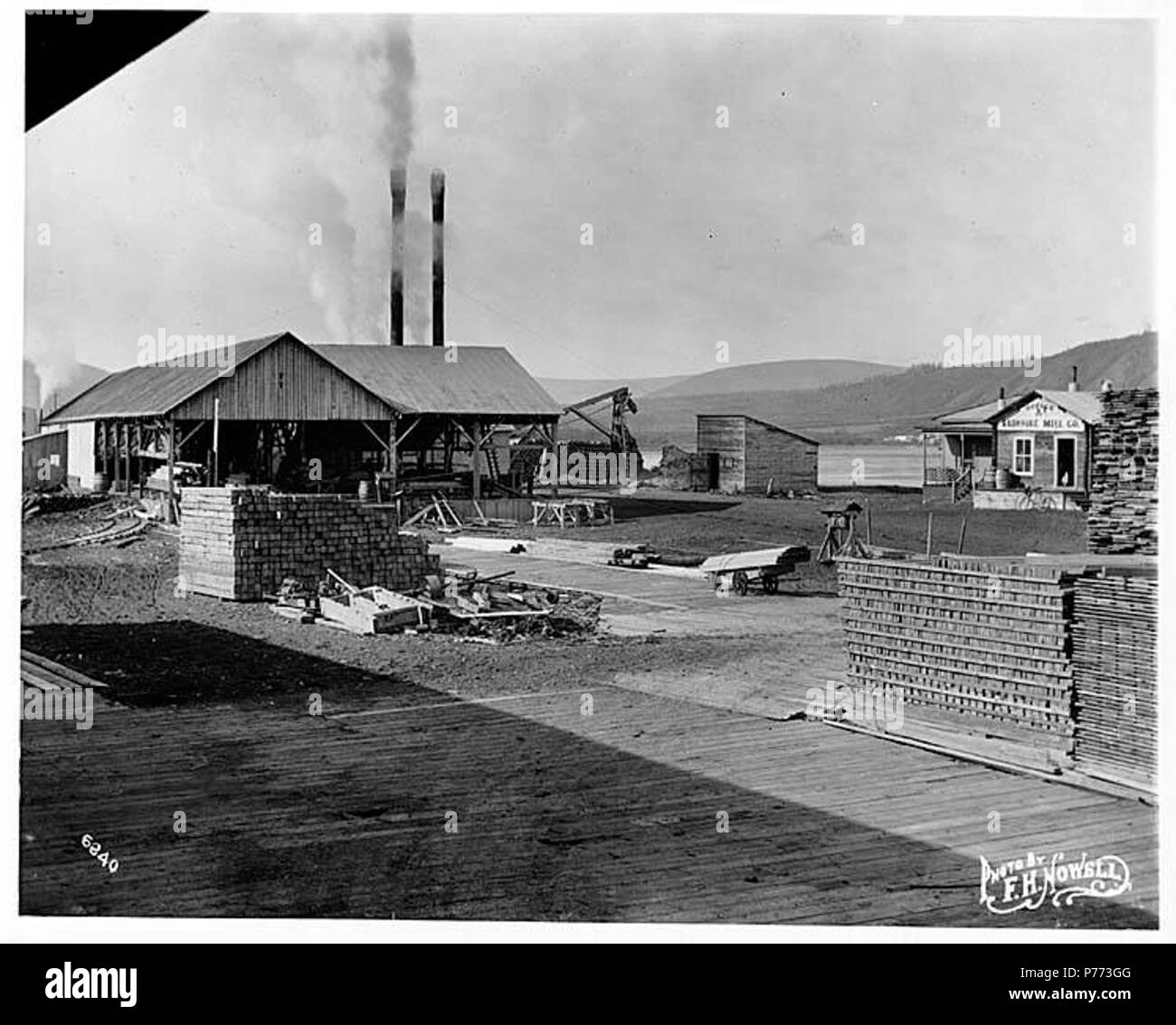 . English Klondike Mill Co. yard, ca. 1905 . English Caption on image