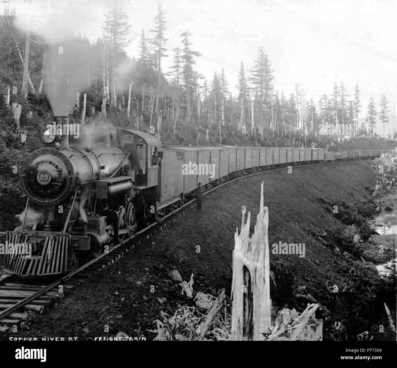 . English: Locomotive No. 20 pulling freight train at Mile 2, vicinity ...