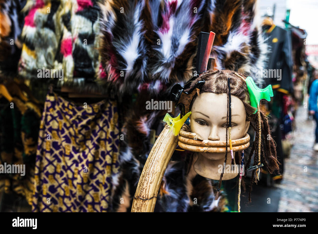 London, England UK  - December 31, 2017: Mannequin head in a fashion shop in Camden Lock Market or Camden Town in London, England, United Kingdom Stock Photo