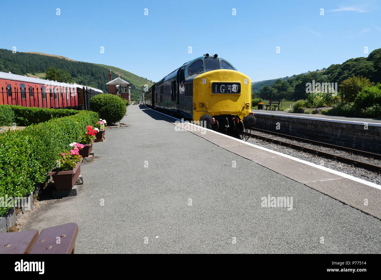 July 03 2018 - Carrog railway station,Wales, UK. with a Class 37 Locomotive group (C37LG) English Electric Type 3. V12 Engine 1700 bhp. Stock Photo