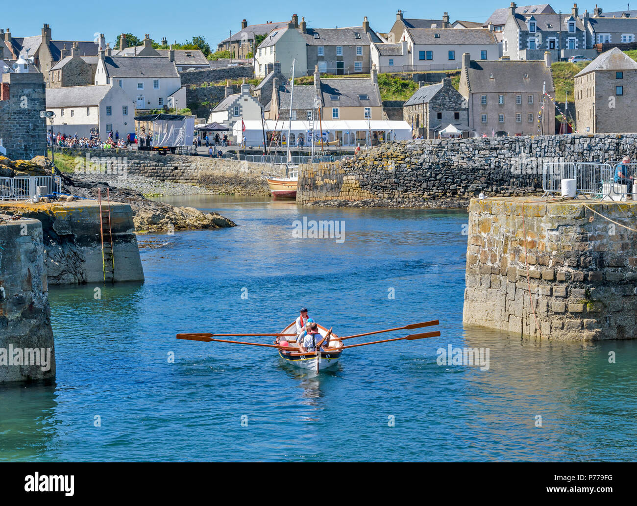 PORTSOY FESTIVAL ABERDEENSHIRE SCOTLAND BOAT RACES BOAT 121 MAIRI