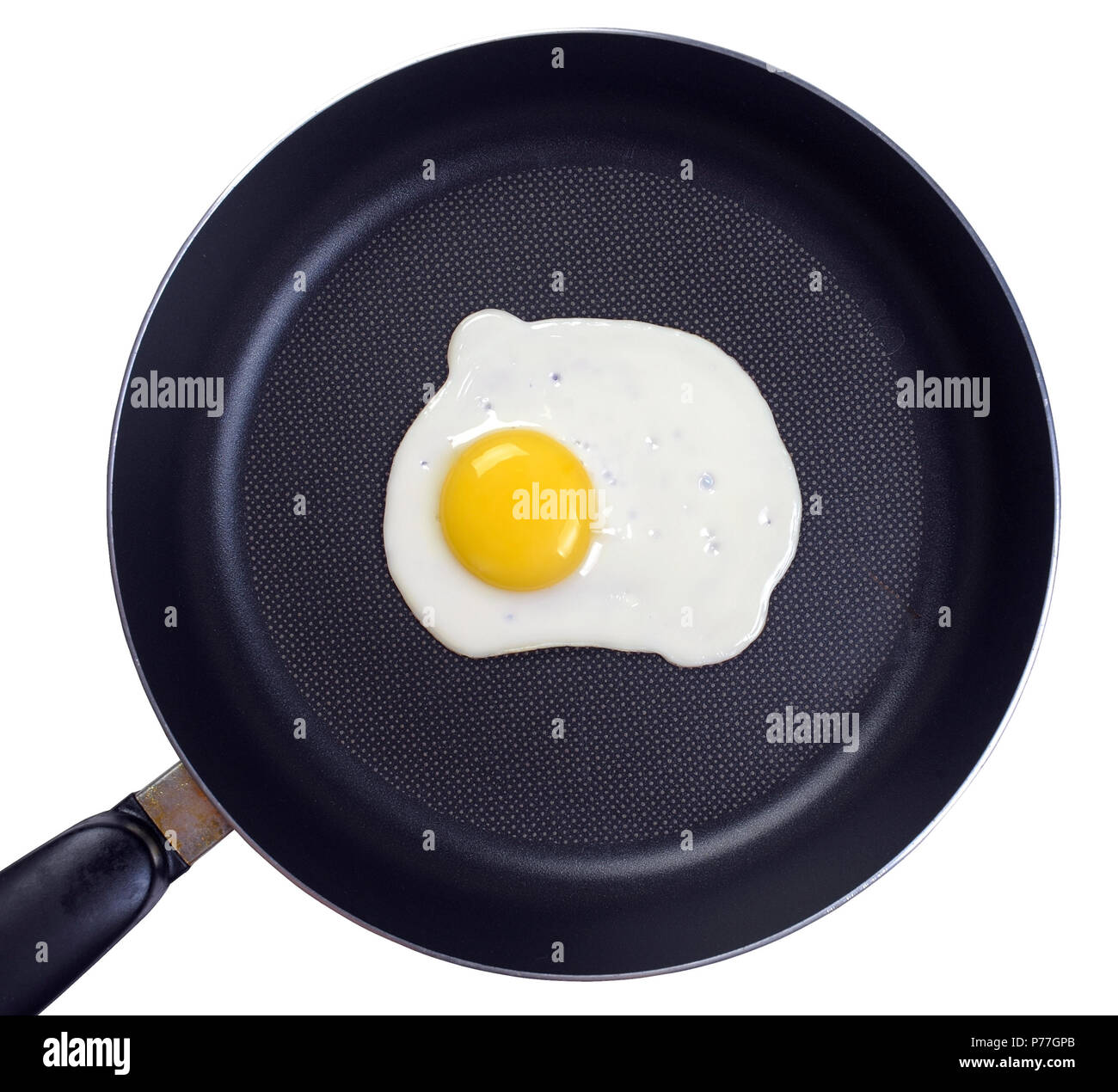 Fried egg in a frying pan Stock Photo - Alamy