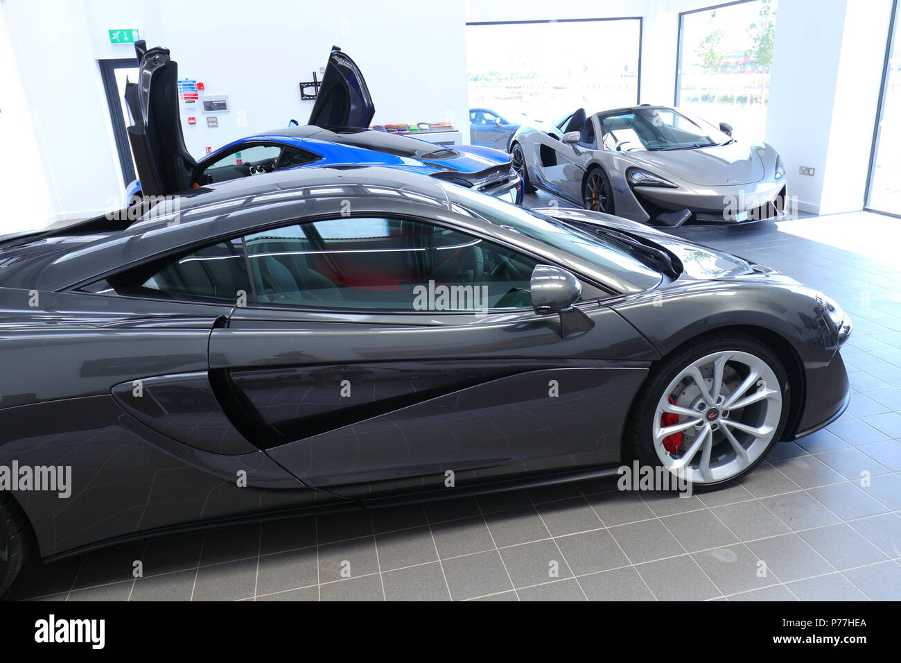 Cars on display at the new Mclaren Sports Cars showroom at Temple Green