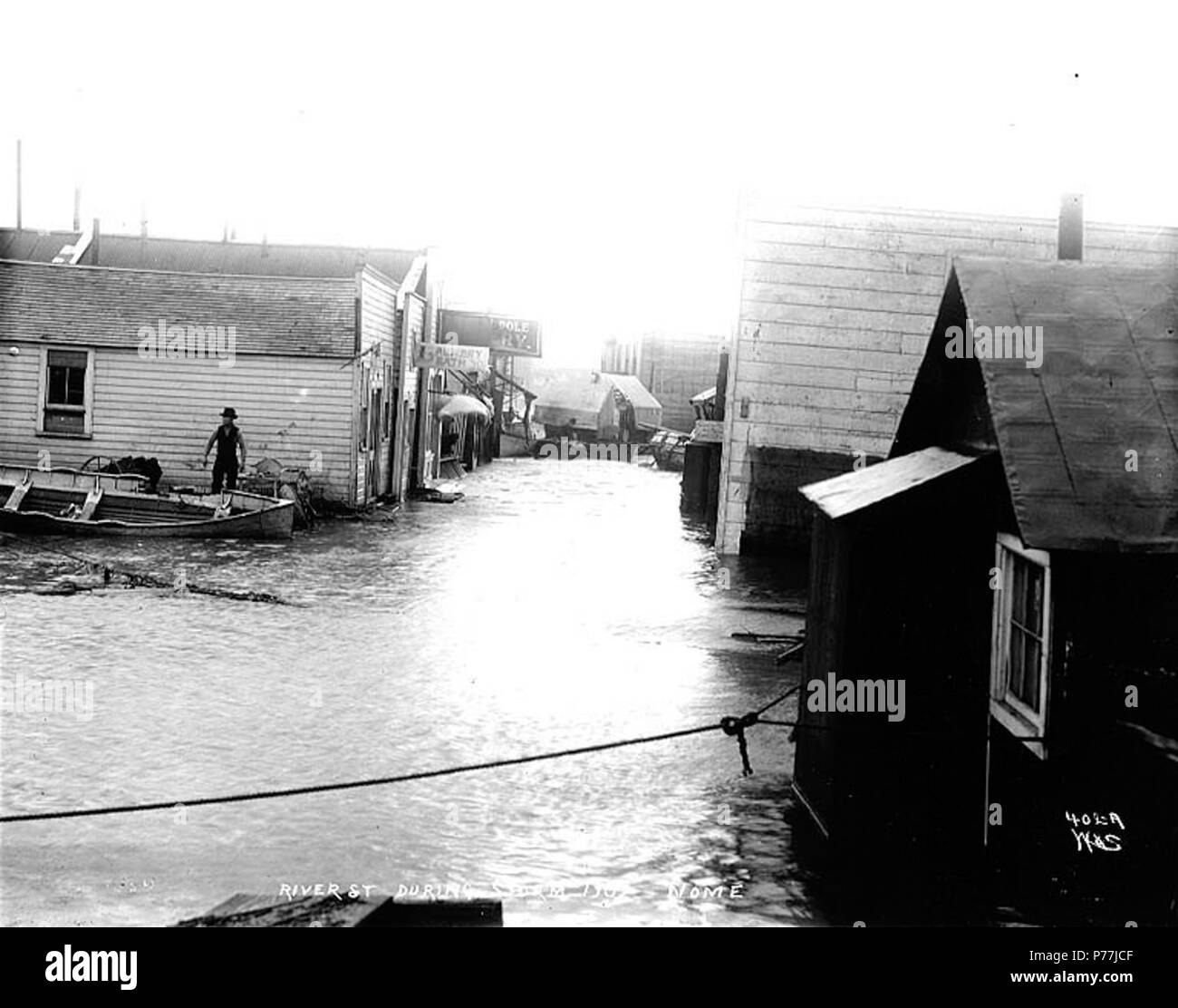 . English River St. flooded after a storm, Nome, Alaska, 1902. English