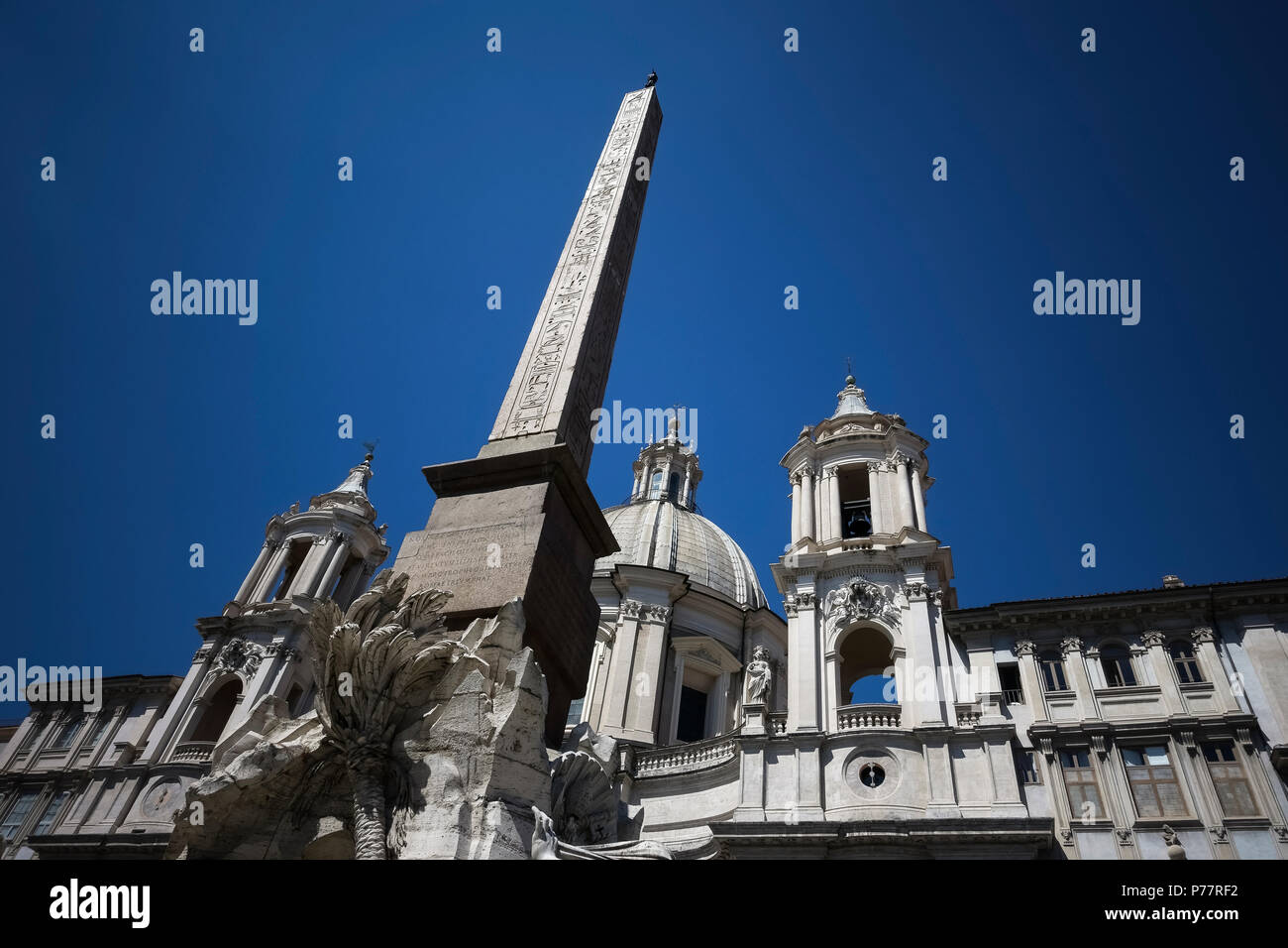 Piazza Navona Square, Bernini's 4 Rivers Fountain and Egyptian obelisk in front of Borromini's Saint Agnese in Agone church. Rome, Italy, Europe, EU. Stock Photo