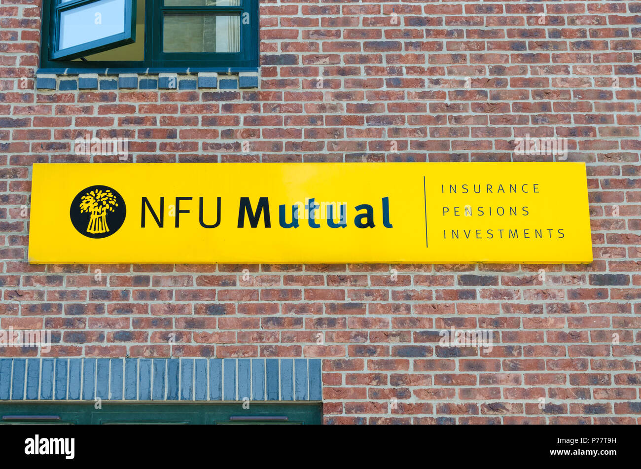 NFU Mutual sign on local office in Uttoxeter, Staffordshire. NFU provides pension,insurance and investment advice for people involved in agriculture Stock Photo