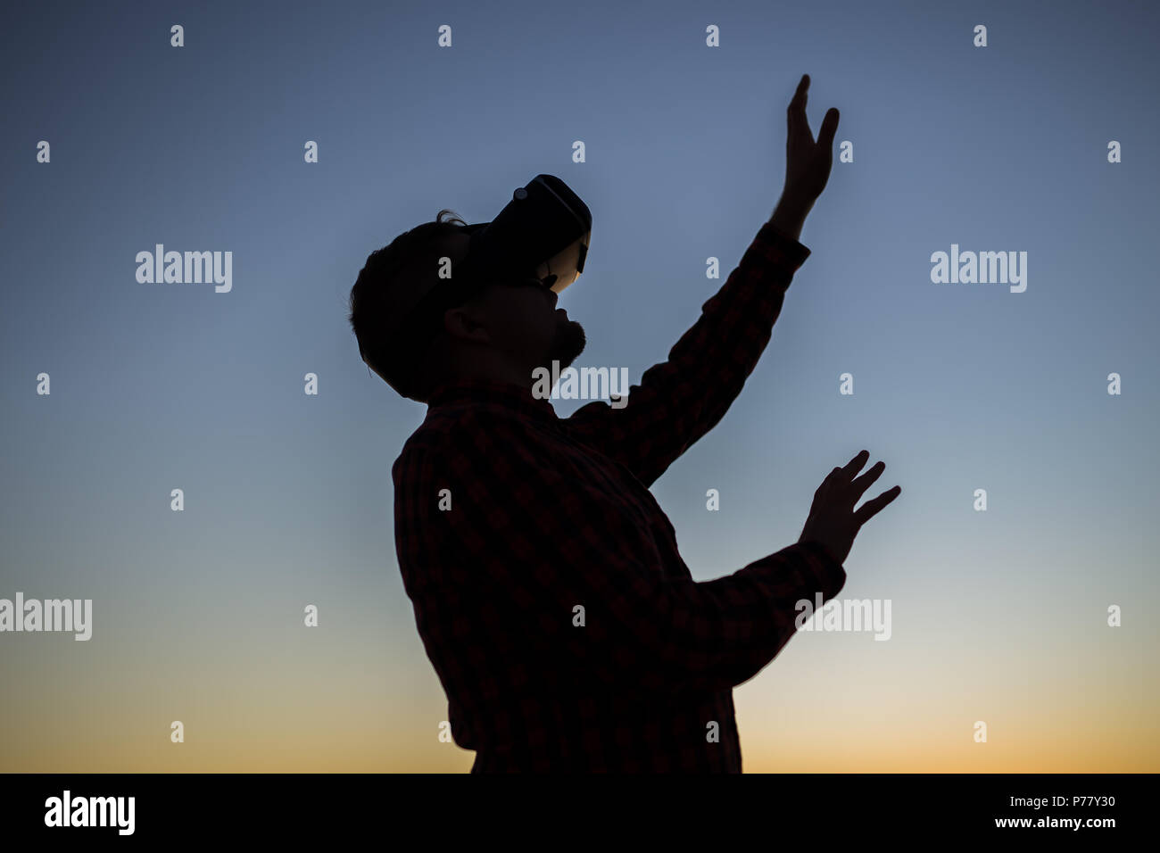 Man wearing virtual reality goggles. Dreams come true Stock Photo - Alamy