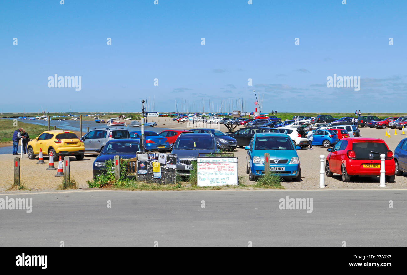 Car parking by the quay and inlet to the harbour on the North Norfolk