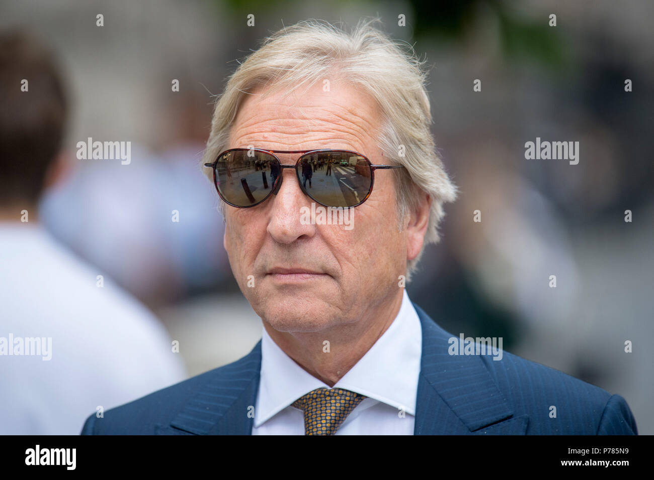 Rupert Martin leaves the High Court in London where Court of Appeal judges are reviewing a 2017 ruling that awarded his estranged wife, Janie Martin, a £73 million settlement following the breakdown of their marriage. Stock Photo