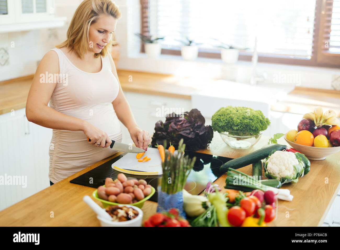 Pregnant woman eating healthy Stock Photo