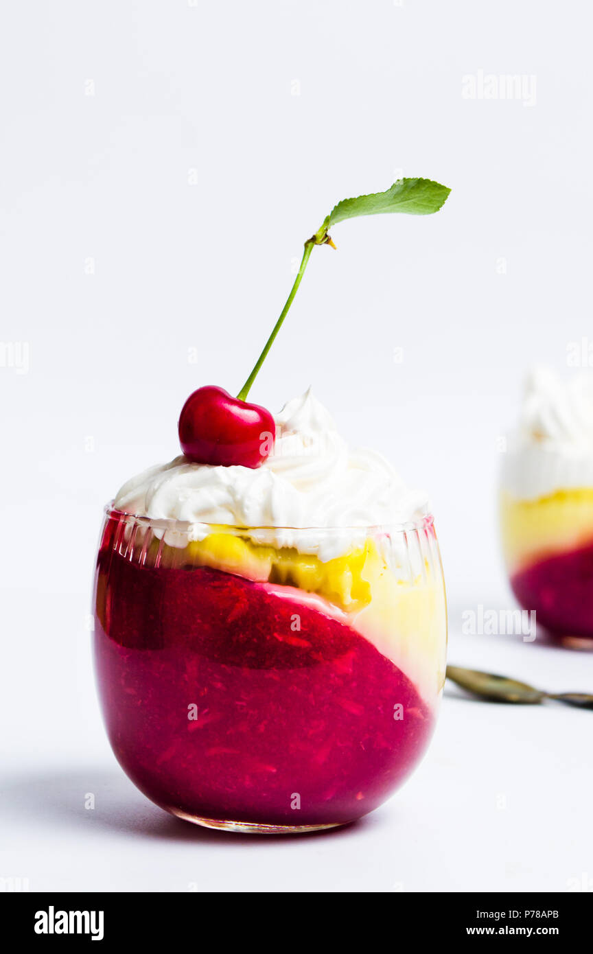 Cherry parfait decorated with fresh fruit in a glass Stock Photo