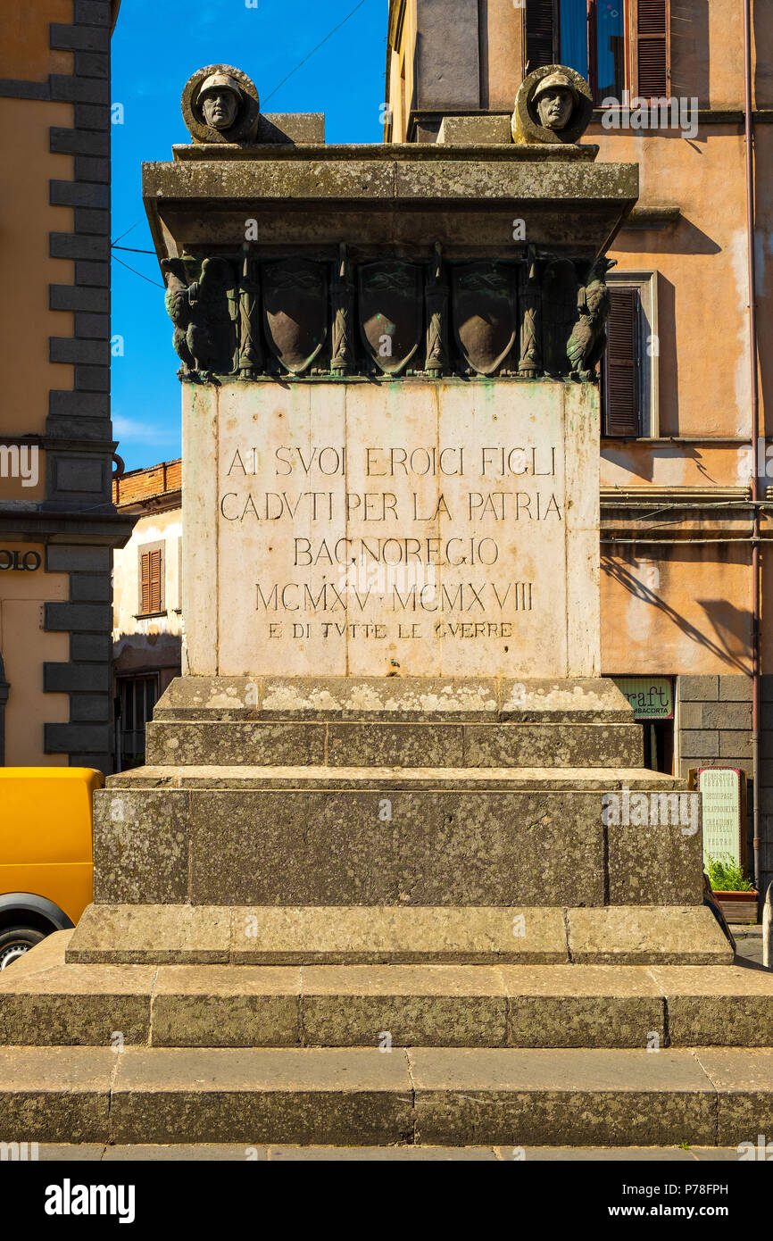 Bagnoregio, Lazio / Italy - 2018/05/26: Historic center of Bagnoregio old town quarter with War Memorial at Piazza Cavour square Stock Photo