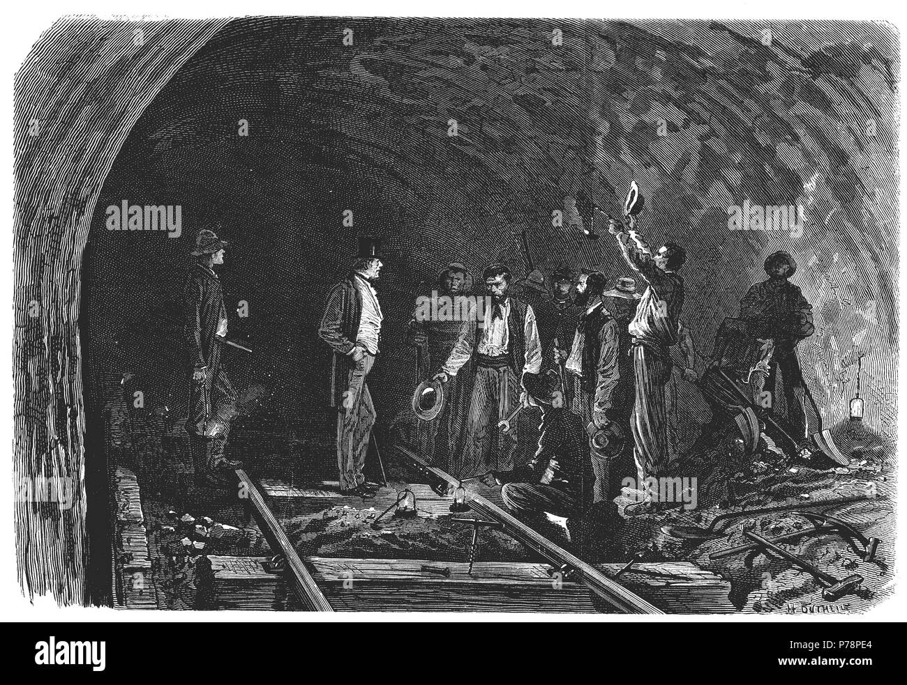 Apertura de los Alpes, túnel de Mont Cenís entre Francia e Italia, unión entre los túneles y colocación del ultimo raíl, en septiembre de 1871. Grabado de época. Stock Photo