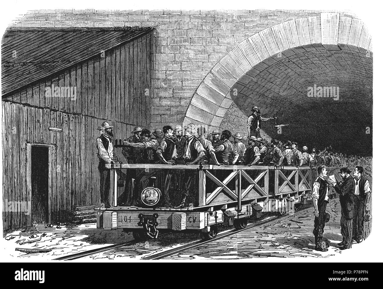 Apertura de los Alpes, salida de los obreros por la boca francesa del Tunel de Mont Cenís entre Francia e Italia después del trabajo, en septiembre de 1871. Grabado de época. Stock Photo