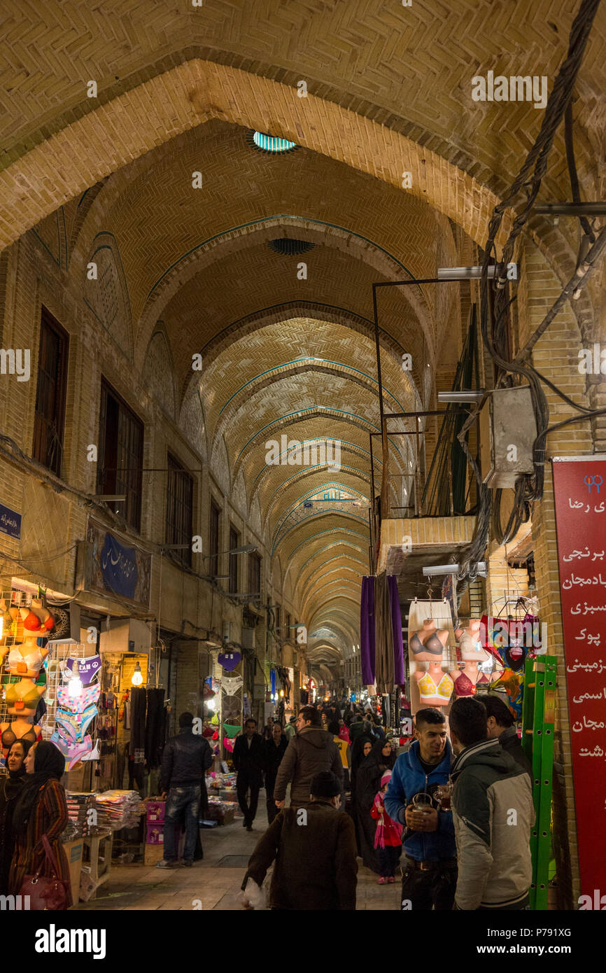 Entrance walkway to the busy and popular covered Grand Bazaar of Tehran, Iran. With its elevated domed roof. Stock Photo