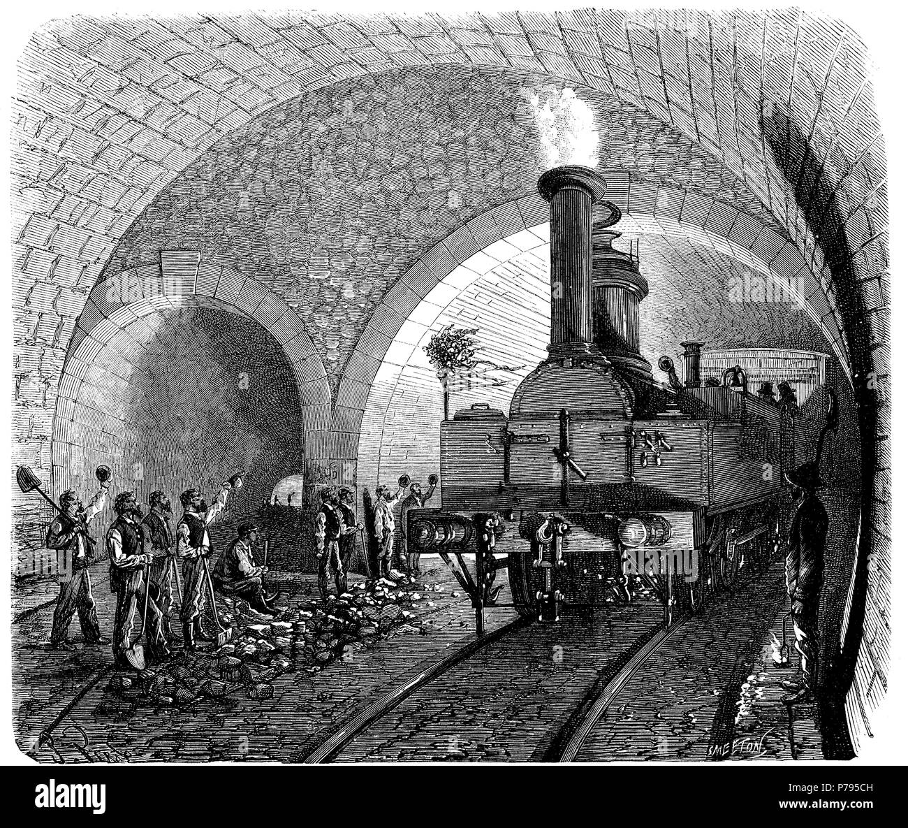 Apertura de los Alpes, paso de la primera locomotora por el Túnel de Mont Cenís, en la intersección de la galeria principal y el empalme, entre Francia e Italia, el día 7 de septiembre de 1871. Grabado de época. Stock Photo