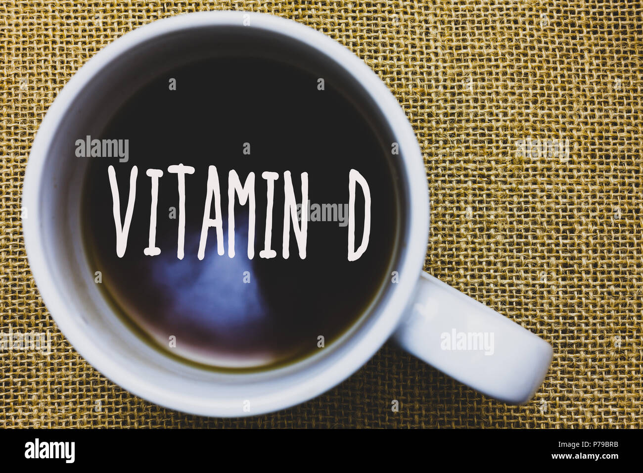 Handwriting text writing Vitamin D. Concept meaning Benefits of sunbeam  exposure and certain fat soluble nutriments Mug coffee thoughts ideas  creative Stock Photo - Alamy