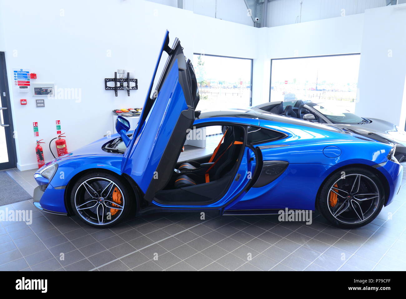 Cars on display at the new Mclaren Sports Cars showroom at Temple Green