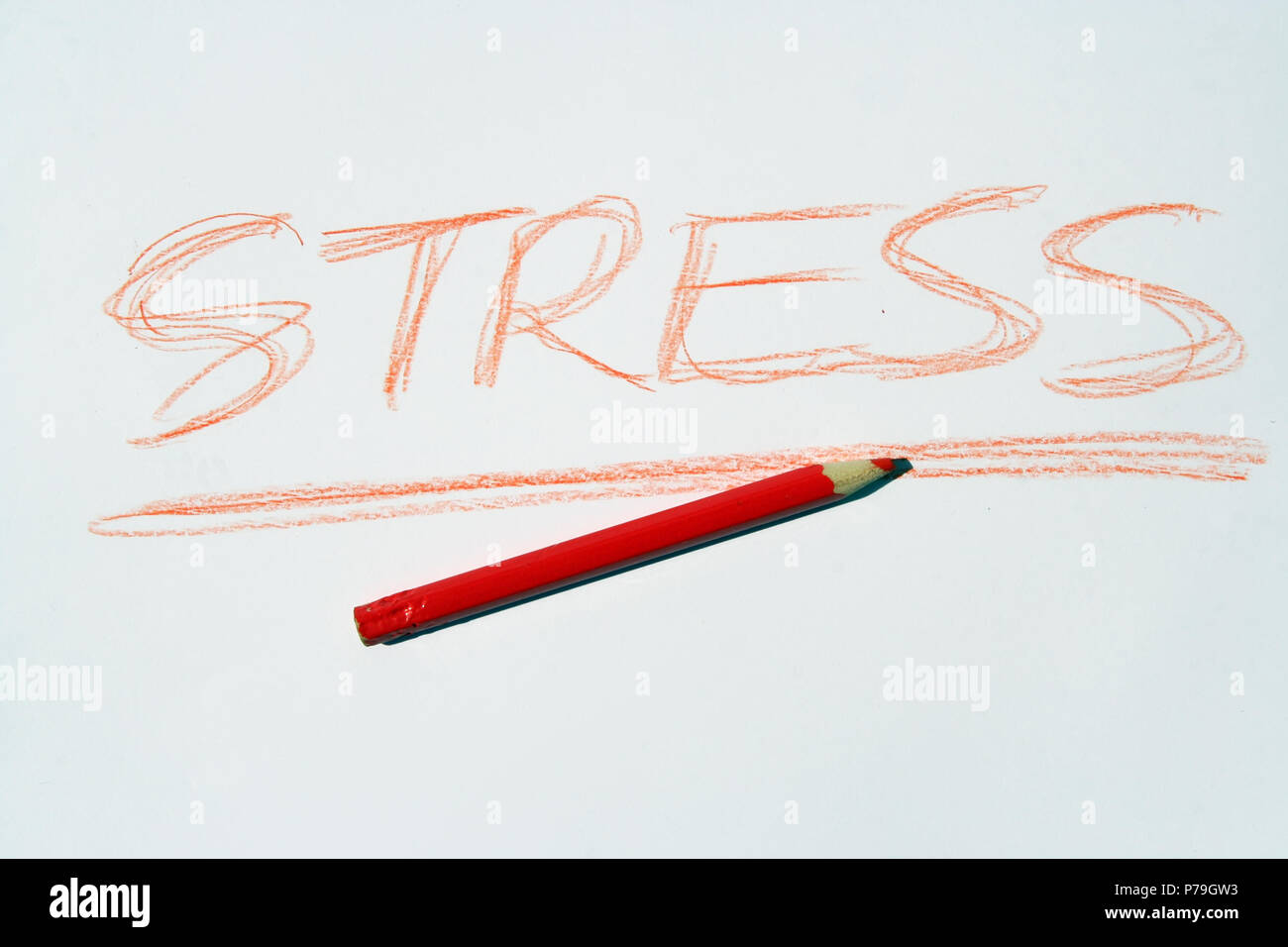 Stress note written with red crayon. Stock Photo