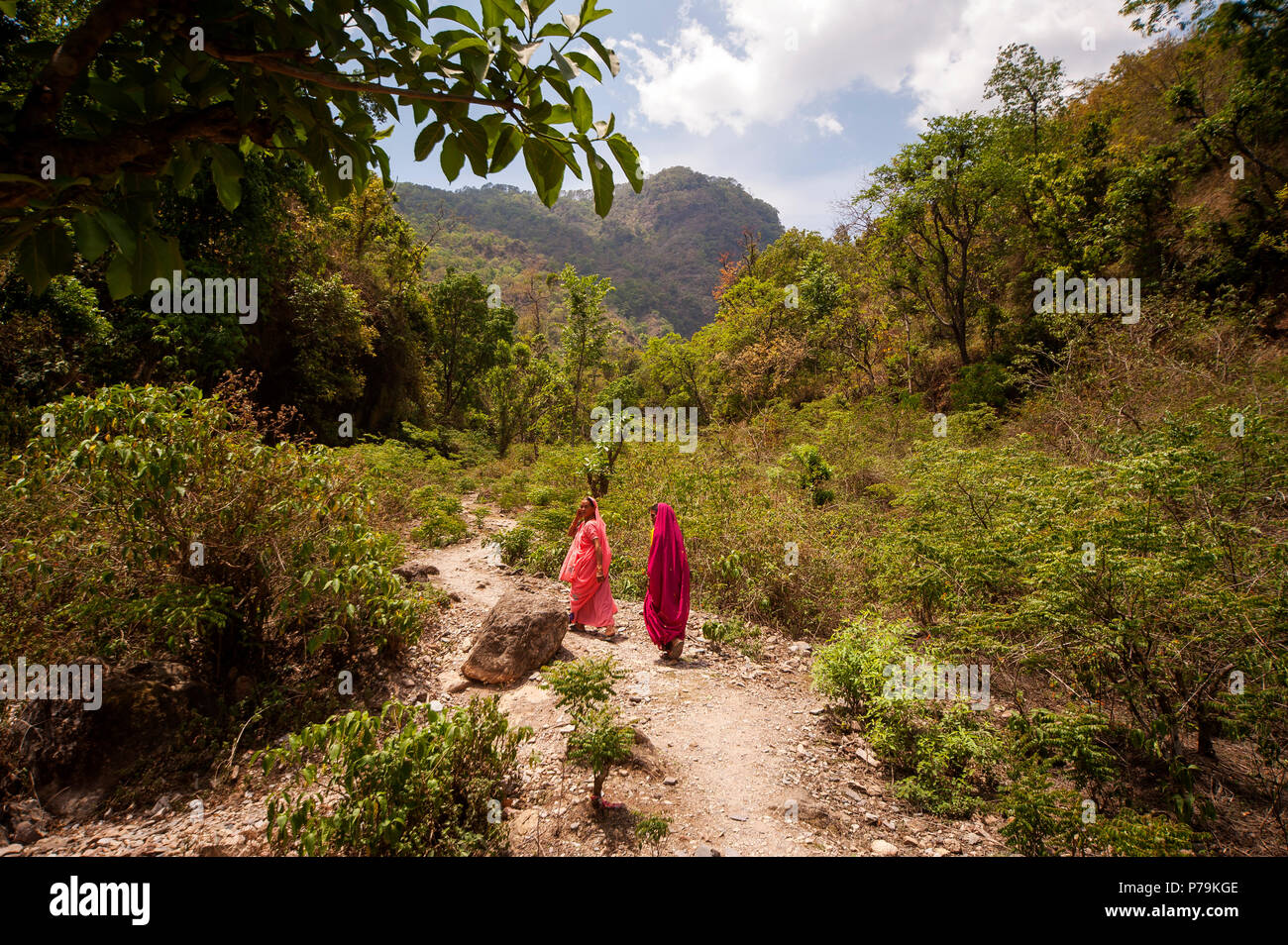 Indian womans in traditional sari at the big ravine where Jim Corbett shot two tigers in 1930 at Kundal Village on Nandhour Valley, Uttarakhand, India Stock Photo