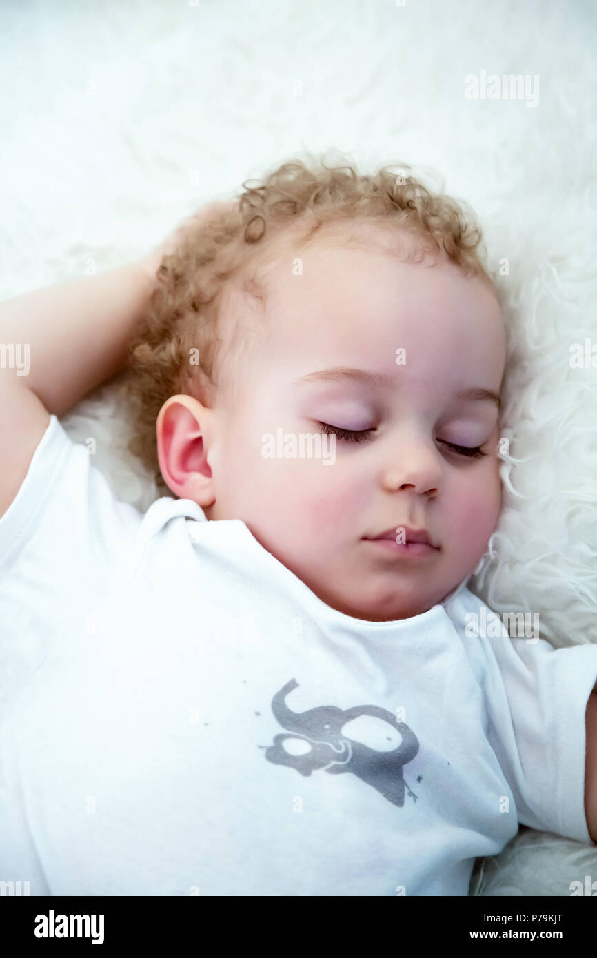 Sleeping baby boy. Closeup portrait of a beautiful sleeping baby boy