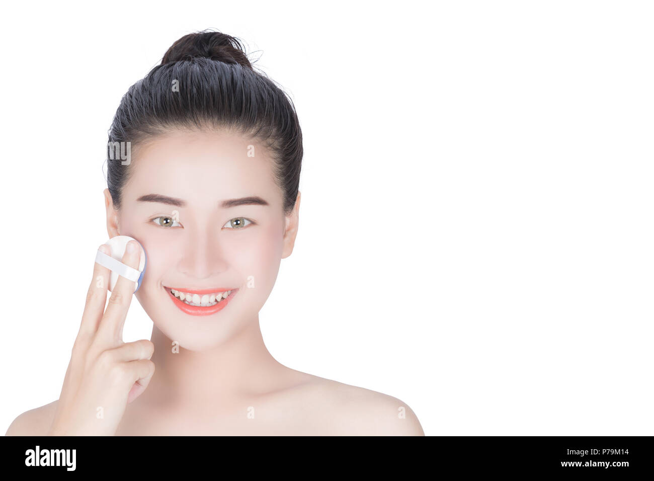 Woman asia pretty woman holding cosmetic cream. Woman asia holding jar with  butter lotion. Woman Touching her Face. Facial treatment . Cosmetology. B Stock Photo