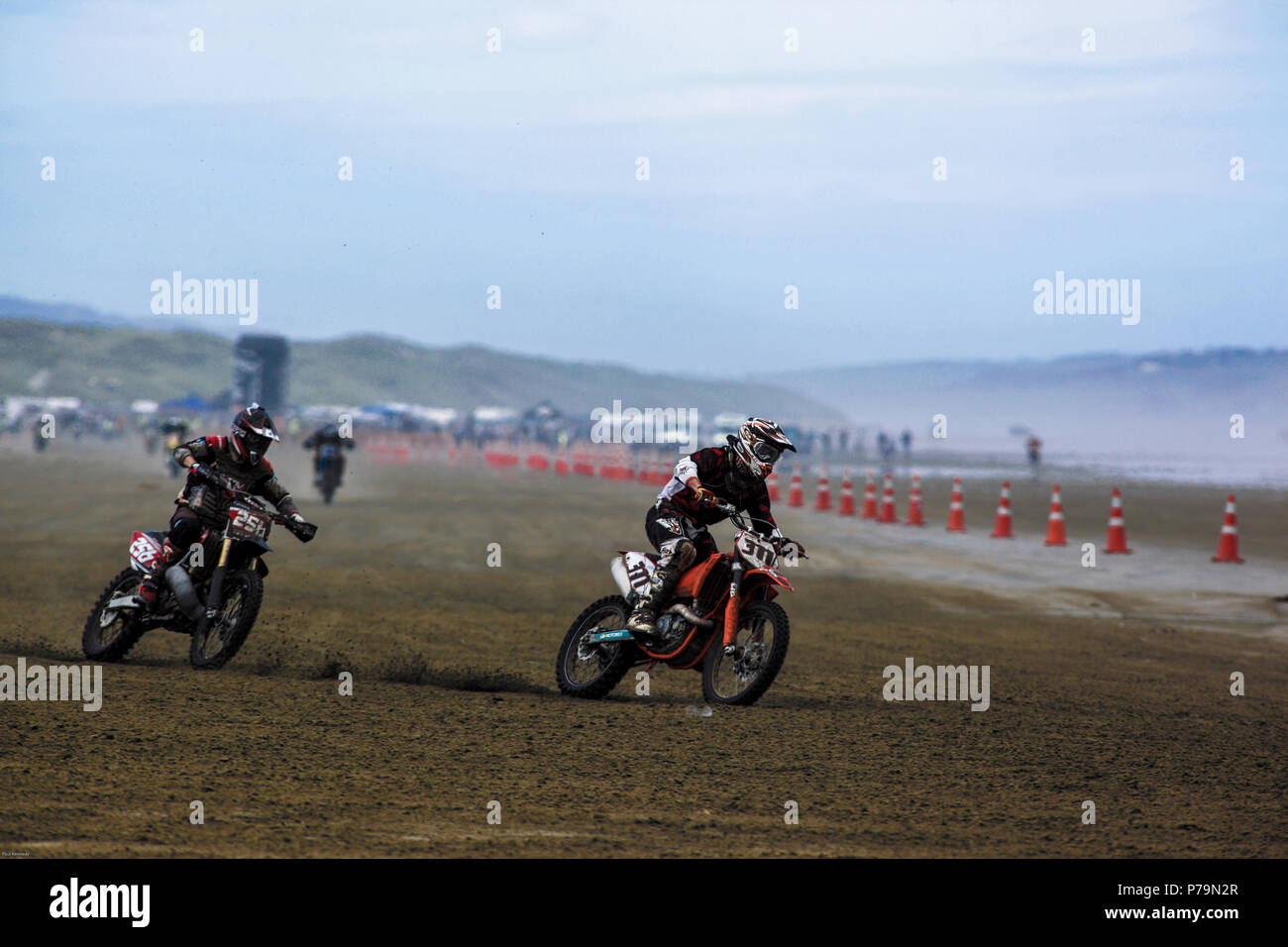 Motorbikes racing in the Burt Munro challenge on Oreti Beach, Invercargill, New Zealand Stock Photo