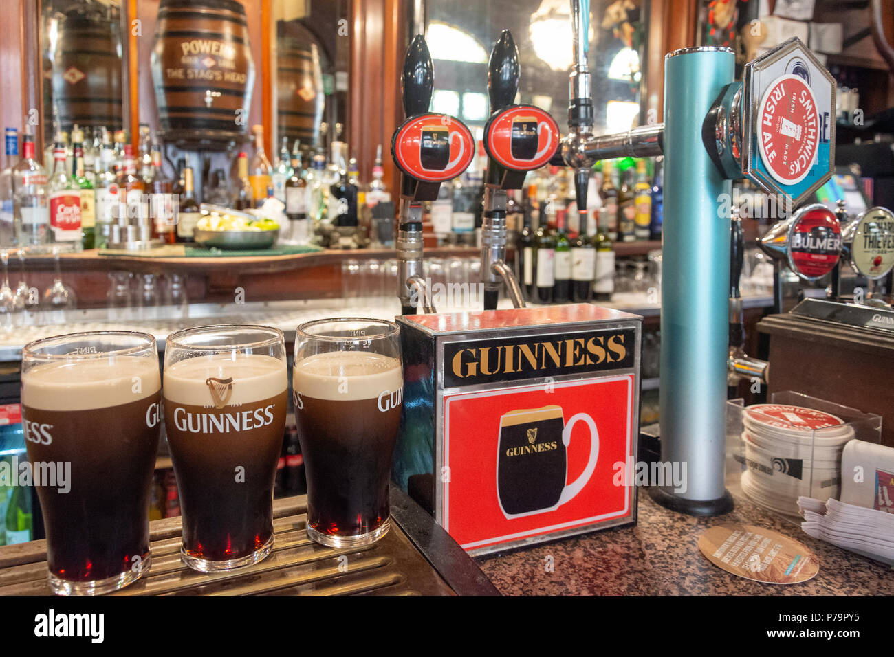 Guinness taps in bar of The Stags Head Pub, Dame Court, Temple Bar, Dublin, Leinster Province, Republic of Ireland Stock Photo