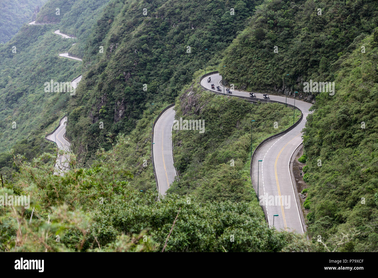 https://c8.alamy.com/comp/P79XCF/santa-catarina-brasil-speedy-motorcycles-riding-on-mountain-road-with-beautiful-landscape-P79XCF.jpg