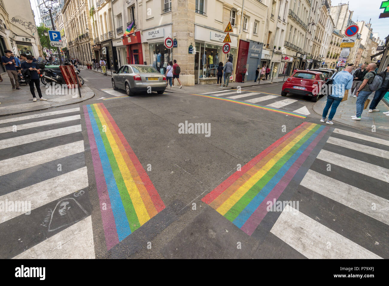 Paris, France - 24 June 2018: Gay pride flag crosswalks in Paris gay village (Le Marais) Stock Photo