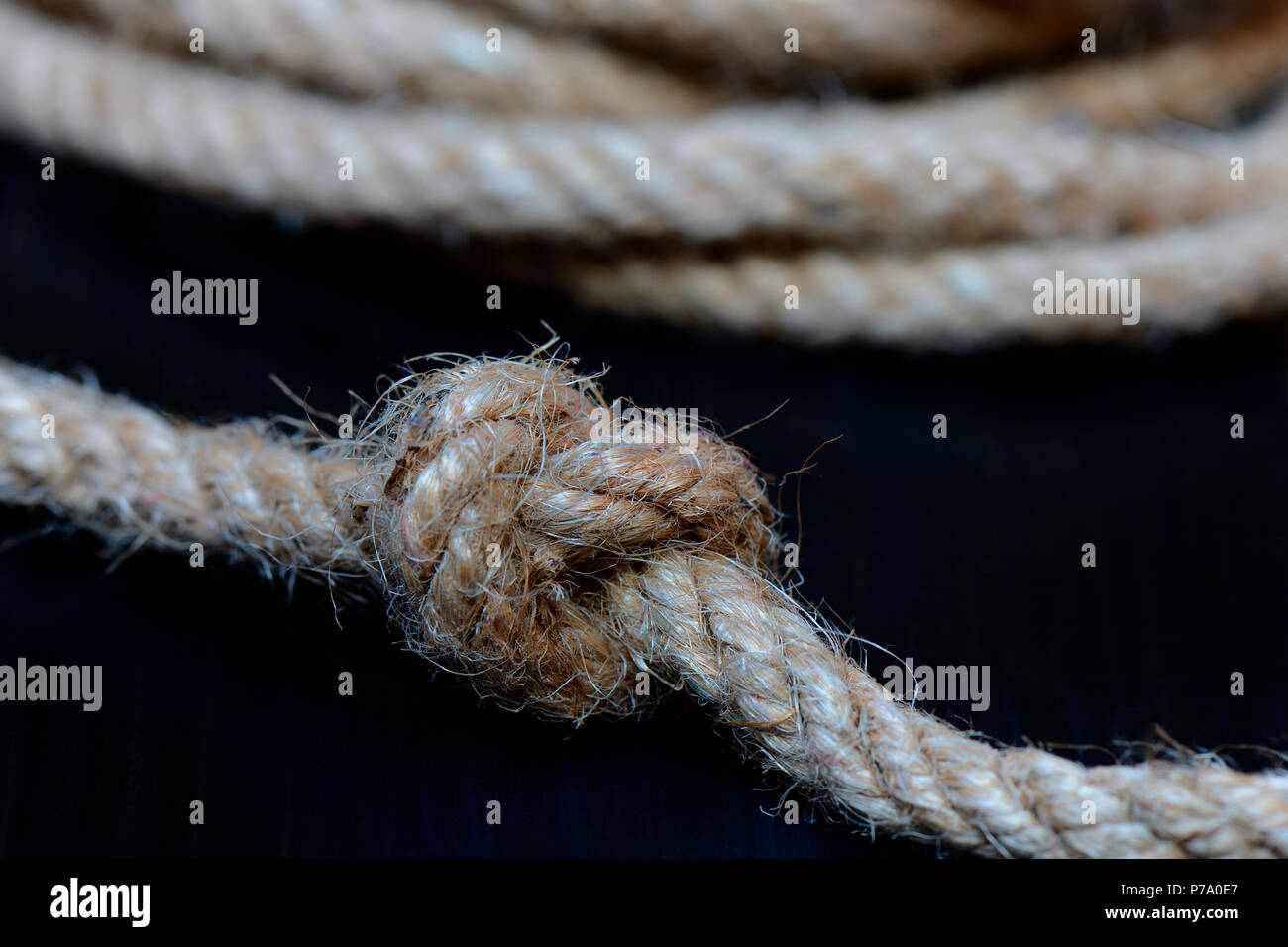 knot in jute rope Stock Photo