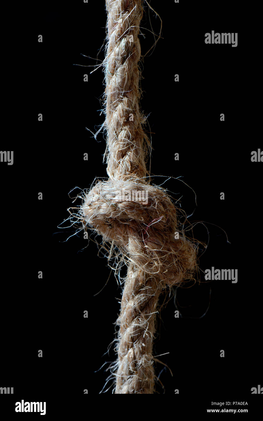 knot in jute rope Stock Photo