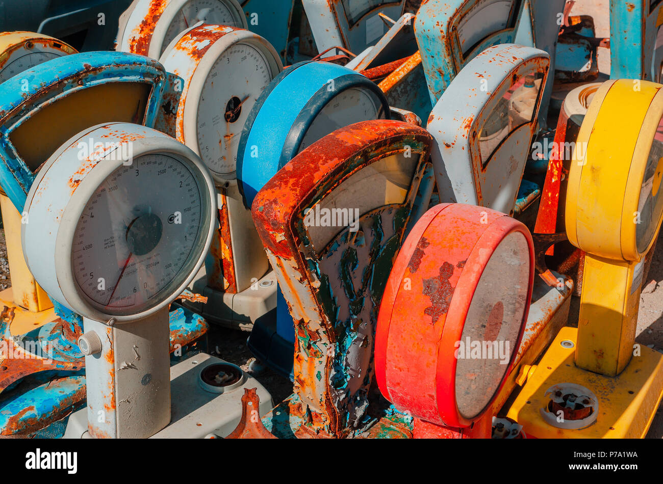 Old rusty food scales. Multicolored textures of rusty metal. Stock Photo