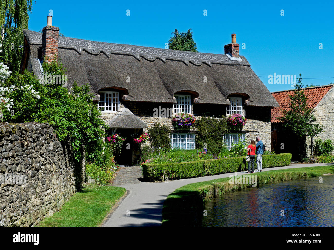 Thatched cottage & Thornton Beck, ThorntonleDale, North Yorkshire